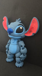 Left side profile view of the articulated Stitch flexi figure showing its poseable limbs