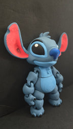 Right side profile view of the 3D printed Stitch flexi figure highlighting its articulated joints and ears