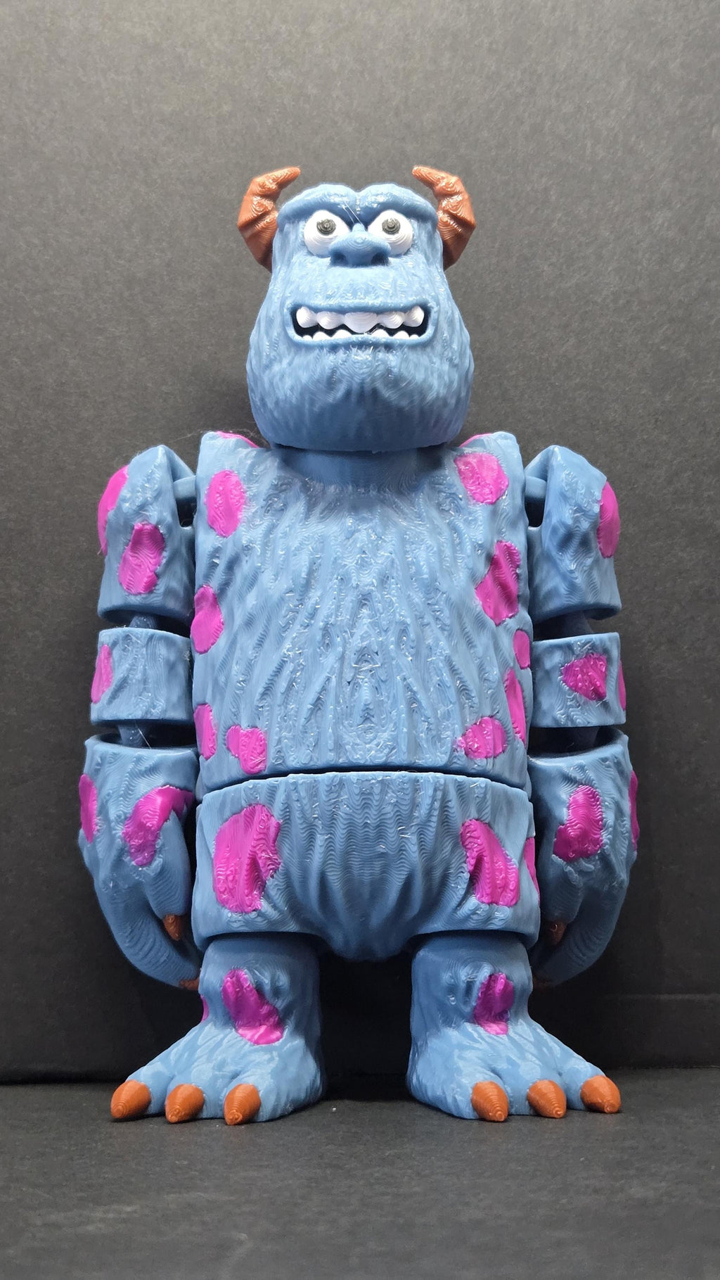 Straight front view of the articulated Sully character flexi figure