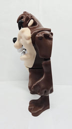 Left side profile view of the flexible Taz figurine demonstrating its multi-layered color texture and arm joints