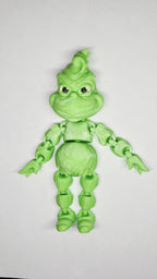 Full-length view of the 3D printed grumpy holiday star flexi figure showing his articulation and character design
