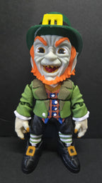 Straight front view focusing on the detailed sinister face, green top hat, and ginger hair of the flexible Leprechaun figure