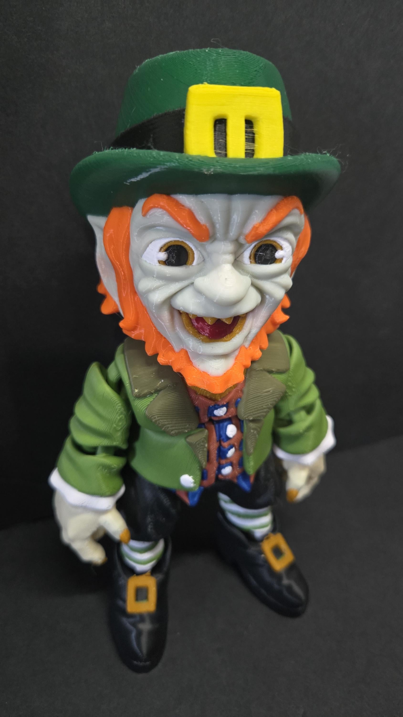 Right side view of the jointed Leprechaun figure slightly flexed to demonstrate the dynamic movement of the leg and arm segments