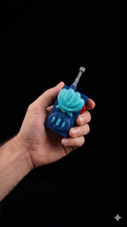 A hand holding the 3D printed walkie-talkie prop to demonstrate its portable, display-friendly scale